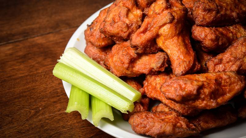 Chicken wings on a plate with celery